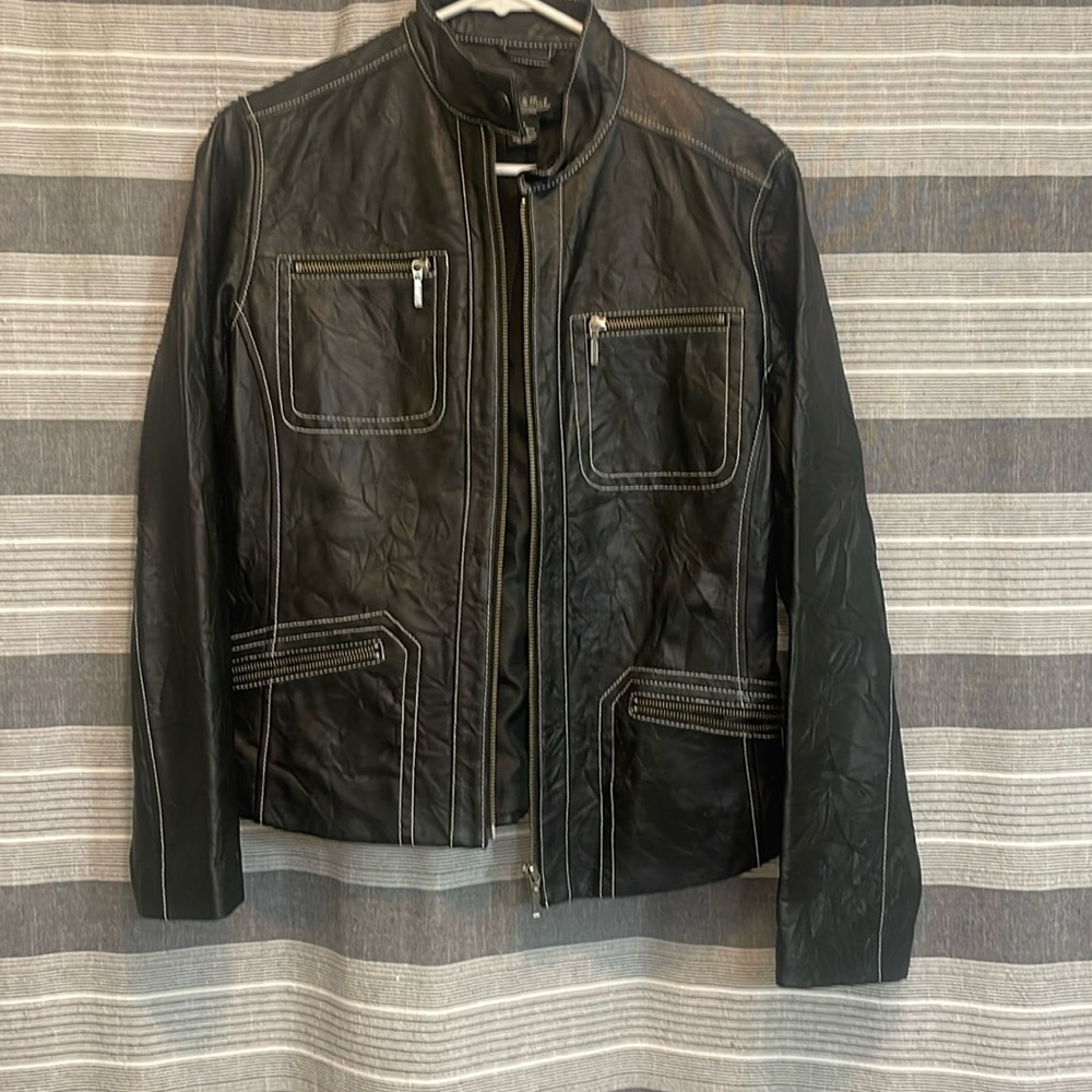 Genuine leather jacket. Like new. So flattering.